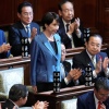 Lawmakers applaud as Sanae Takaichi is elected Japan's new prime minister during a parliamentary session in Tokyo, Oct. 21, 2025.